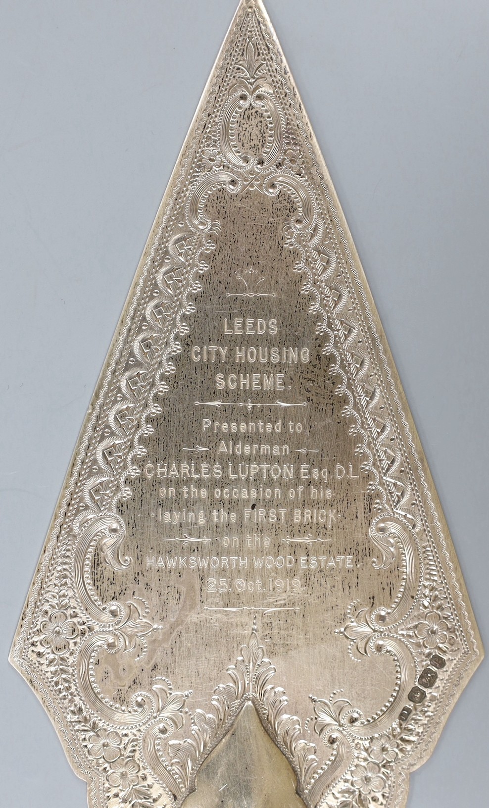 A late Victorian engraved silver presentation trowel, Sheffield, 1897, with later engraved inscription, no handle, 19.5cm, 153 grams.